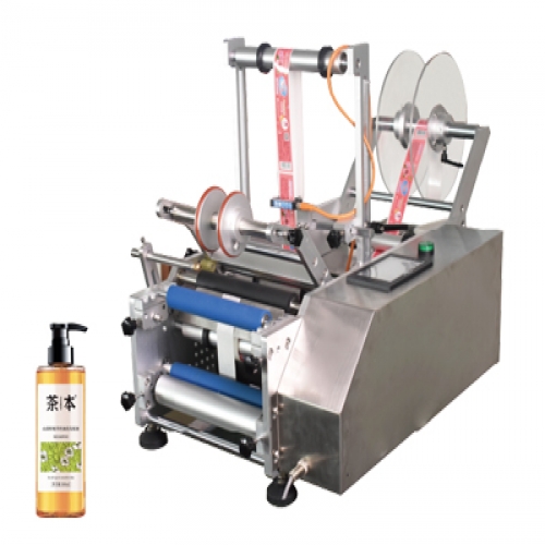 半自動沐浴露圓瓶貼標(biāo)機